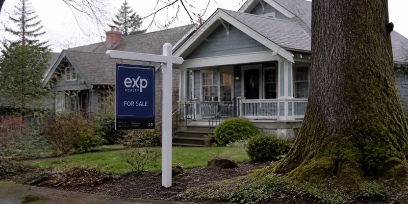 eXp Realty for-sale sign on a Portland Craftsman home, Oregon