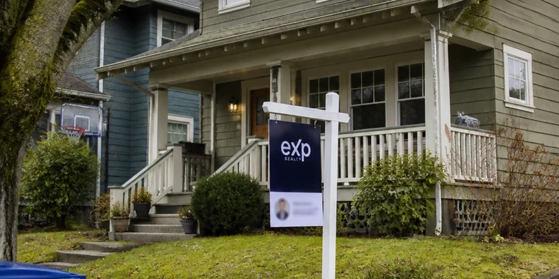 eXp Realty for sale sign in front of Portland Oregon Craftsman home