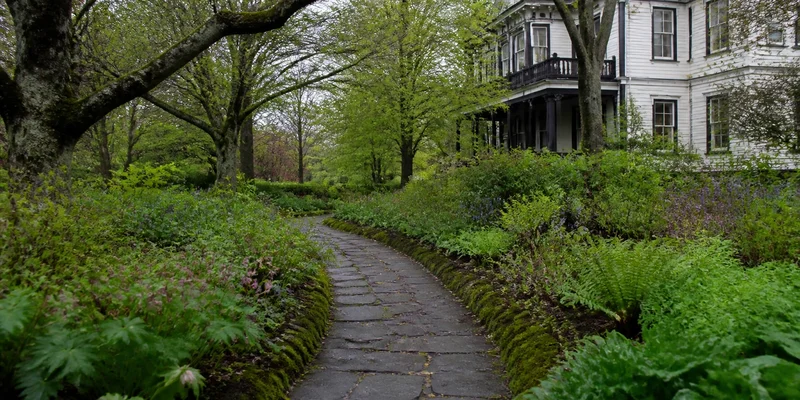 Traditional walled Chinese garden courtyard with koi pond and circular moon gate Pearl District Portland Oregon