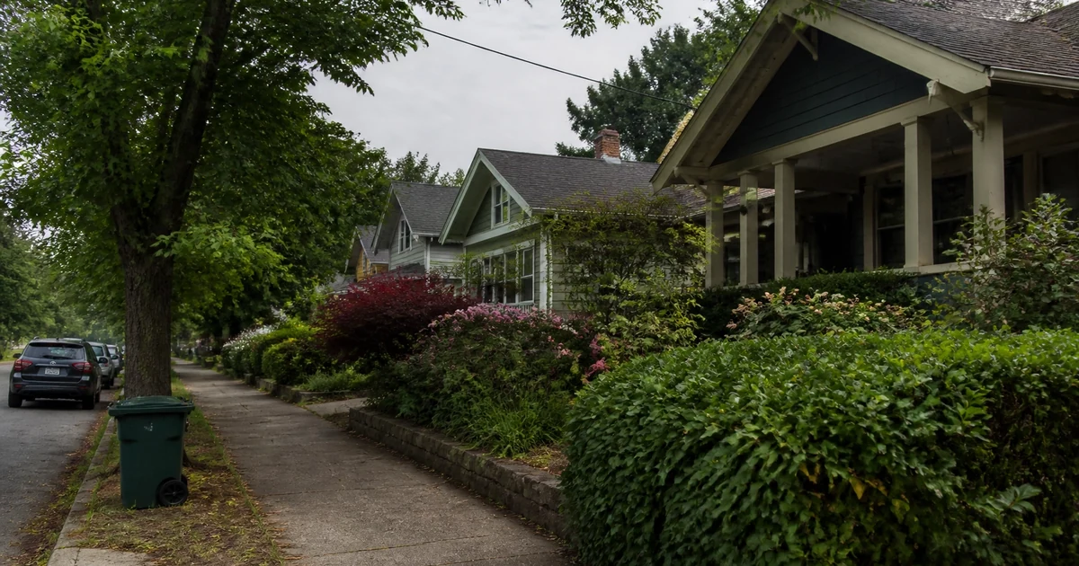 Tree-lined residential street with craftsman homes, Portland, Oregon